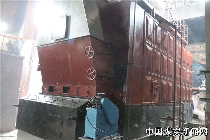 温暖每个岗位 净化一片天空——龙煤七台河矿业公司铁东选煤厂更新改造锅炉侧记(图1)